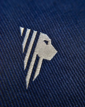 Tie lion logo detail